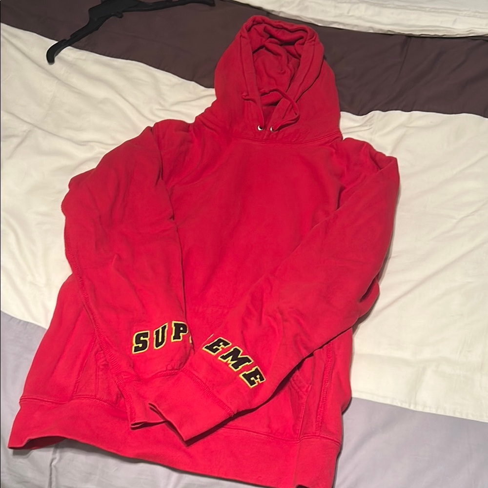 Supreme Red Hoodie with Sleeve Branding